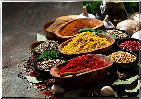 Different types of spices in small bowls.